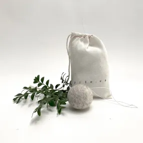 felted wool balls (in cotton bag)